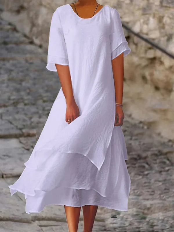 Ava Kleid: Elegantes Blockstreifen-Schlitzkleid