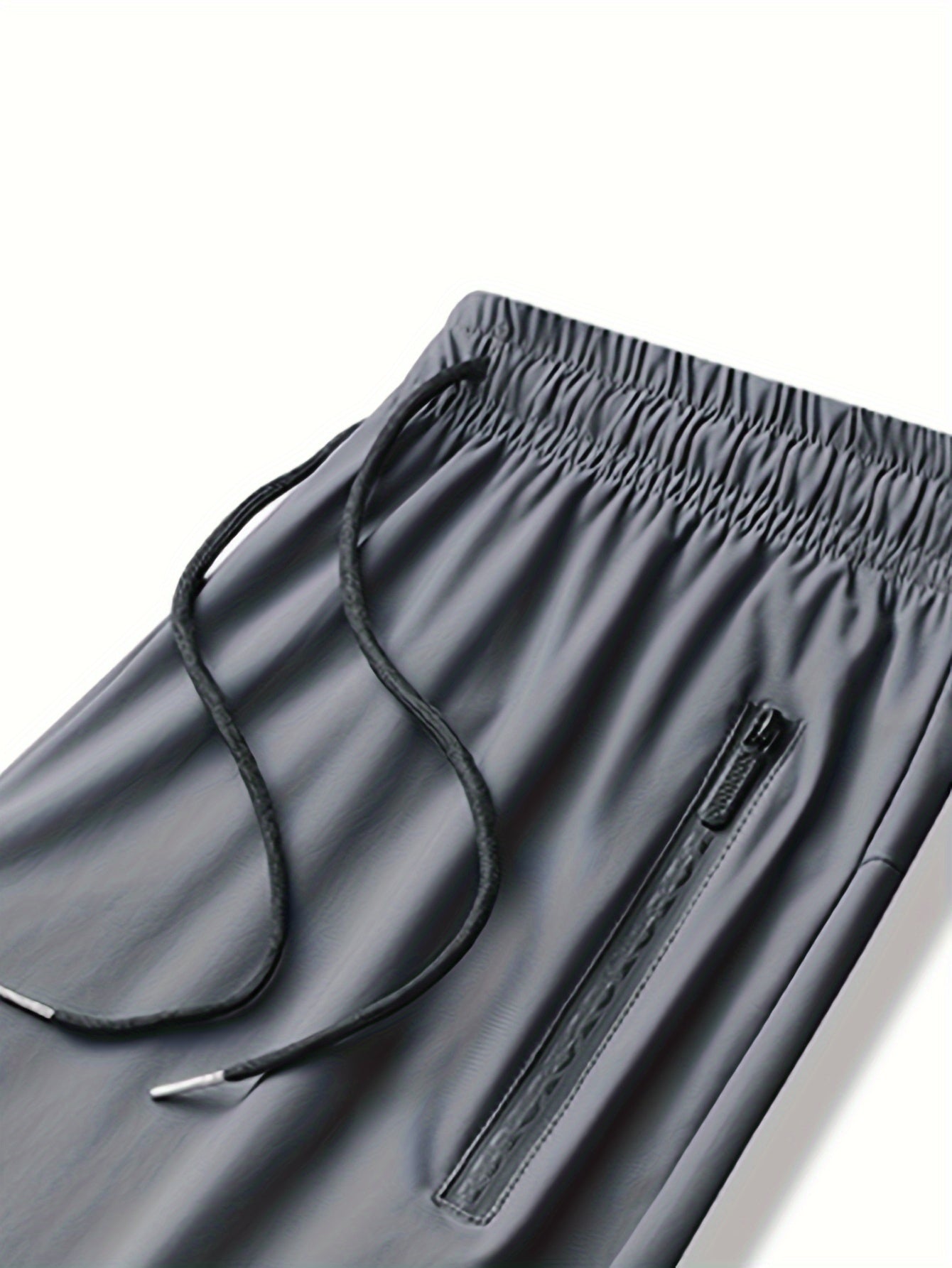 FlexJog™ – Atmungsaktive Herren Sporthose mit Reißverschlusstaschen