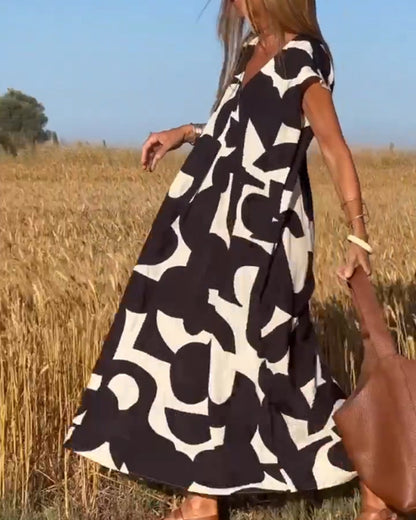 Amara™ - Maxikleid mit Print und V-Ausschnitt