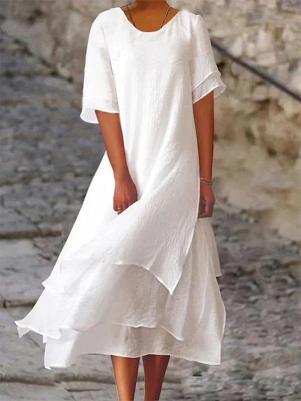 Ava Kleid: Elegantes Blockstreifen-Schlitzkleid
