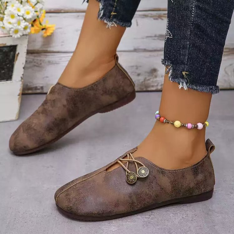 Damen Komfortable und stilvolle Slipper mit dekorativen Schnürdetails