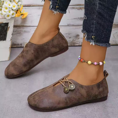 Damen Komfortable und stilvolle Slipper mit dekorativen Schnürdetails