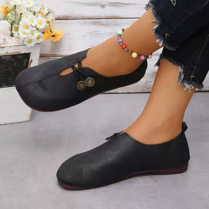 Damen Komfortable und stilvolle Slipper mit dekorativen Schnürdetails