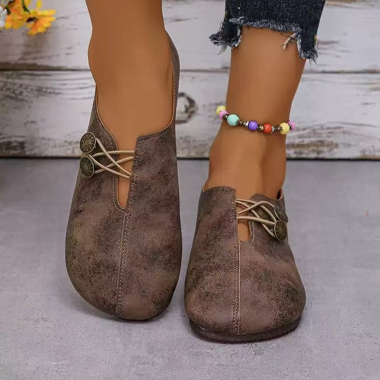 Damen Komfortable und stilvolle Slipper mit dekorativen Schnürdetails