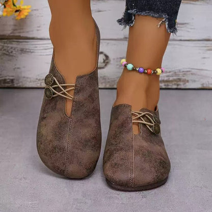 Damen Komfortable und stilvolle Slipper mit dekorativen Schnürdetails