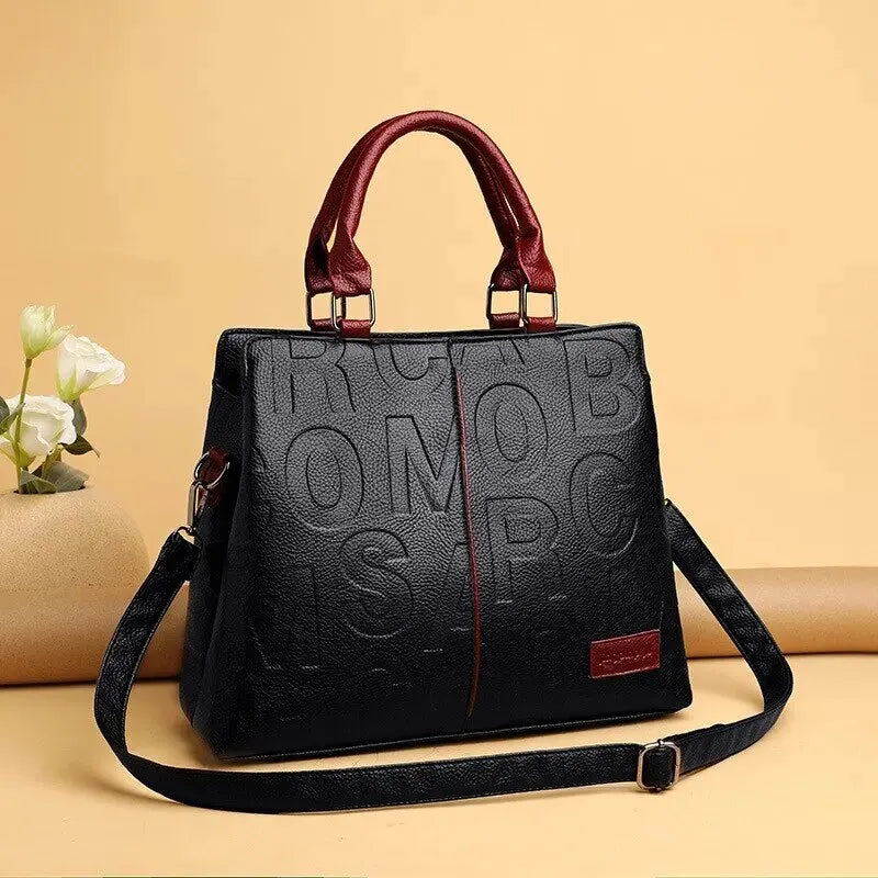 Elarova | Damenhandtasche aus weichem Leder mit geprägtem Buchstabendesign