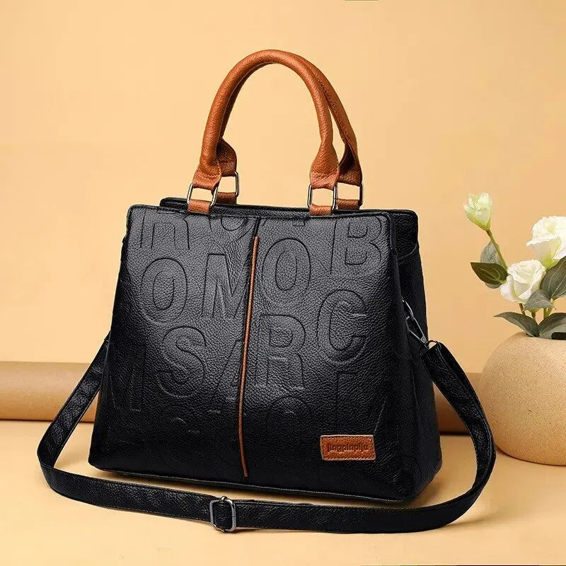 Elarova | Damenhandtasche aus weichem Leder mit geprägtem Buchstabendesign