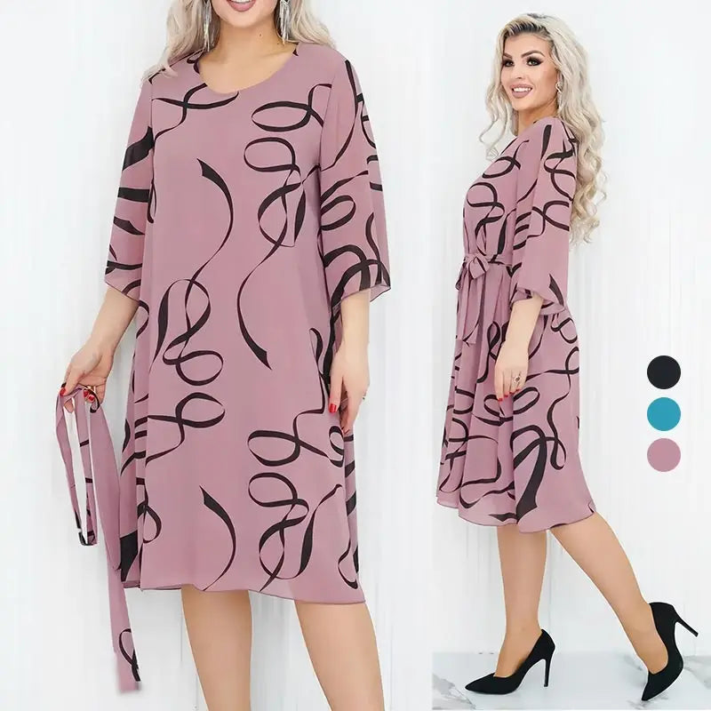 Elegante, loszittende midi jurk voor dames met geprinte, gerimpelde mouwen en ronde hals.