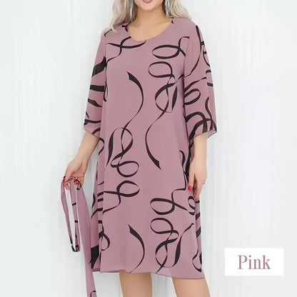 Elegante, loszittende midi jurk voor dames met geprinte, gerimpelde mouwen en ronde hals.