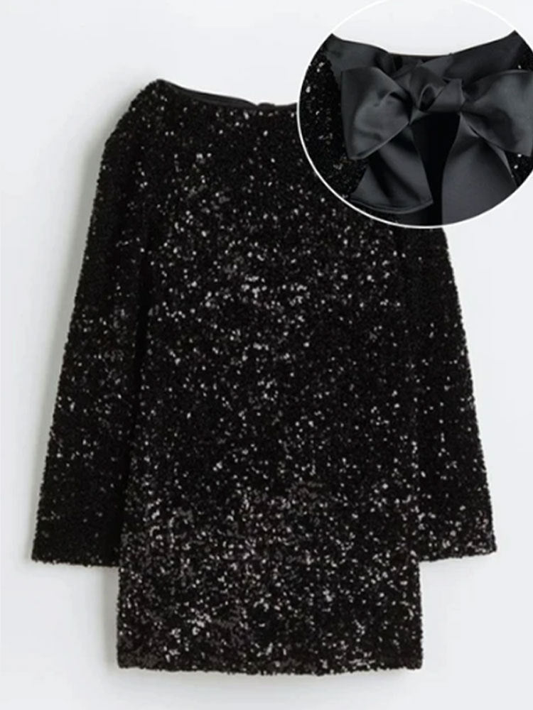 Kleid von Barbara: Pailletten, Schleife am Rücken, Rundhals