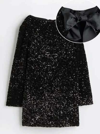 Kleid von Barbara: Pailletten, Schleife am Rücken, Rundhals