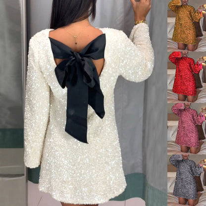 Kleid von Barbara: Pailletten, Schleife am Rücken, Rundhals